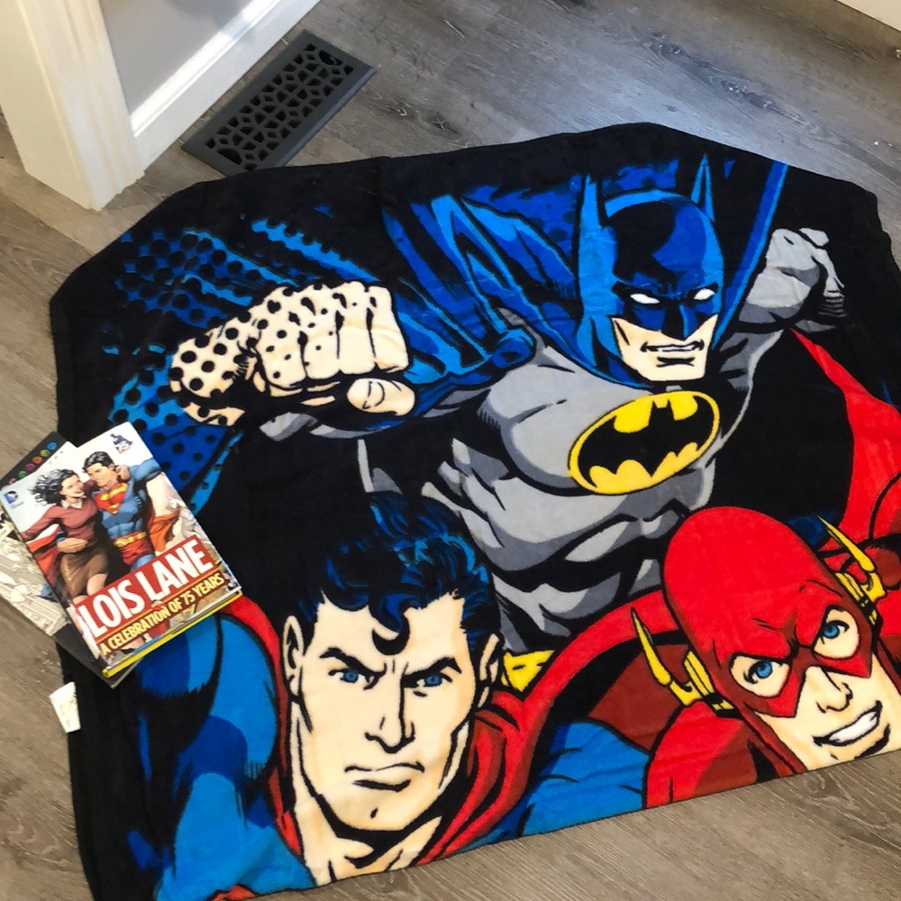Superhero throw and books
